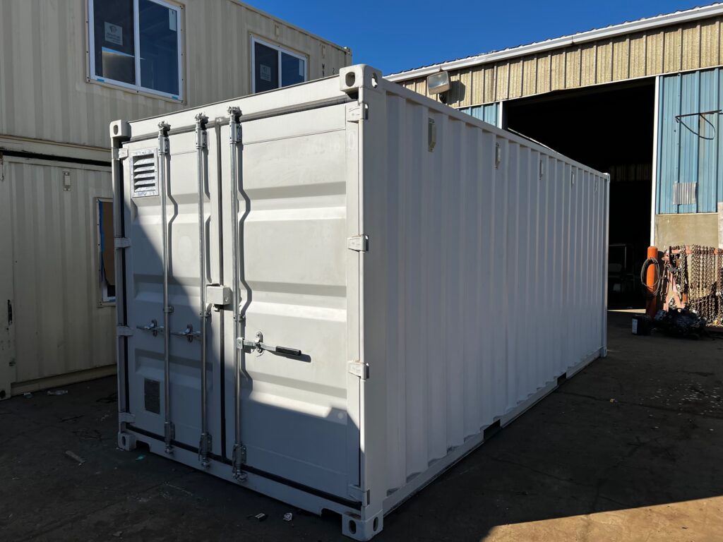 (exterior) 20 foot modified cargo container with 3068 personnel doors and interior partition walls to create three separate compartments