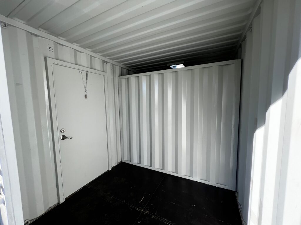 (interior) 20 foot modified shipping container with 3068 personnel doors and interior partition walls to create three separate compartments