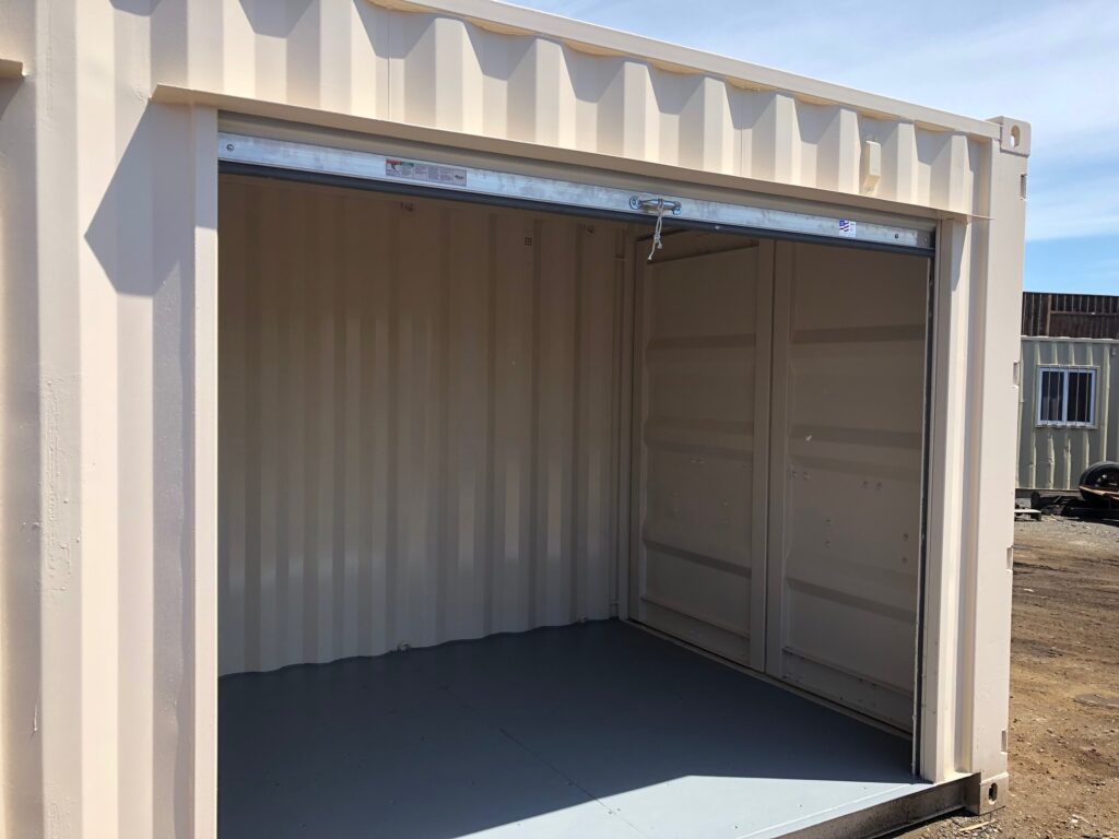 40' container modified to include several roll up doors and interior partition walls to form separate compartments