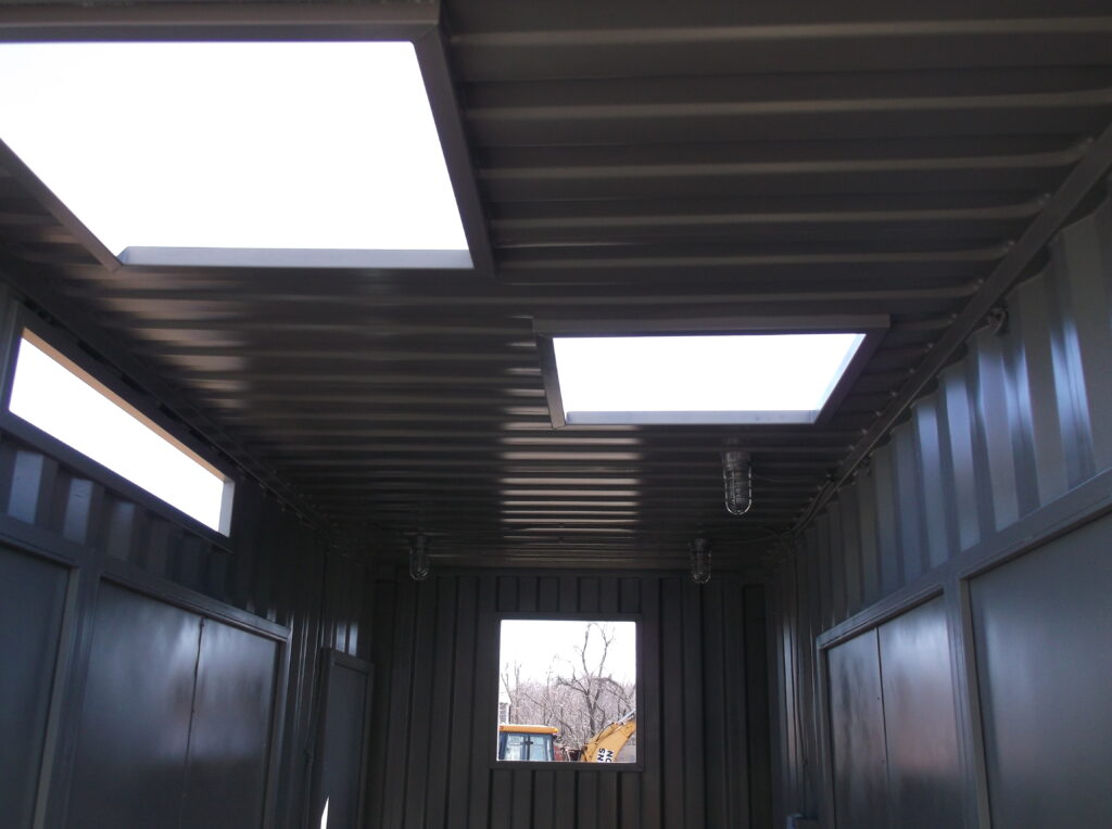 Sea Box Container with various cut outs and personnel doors installed (interior looking up)