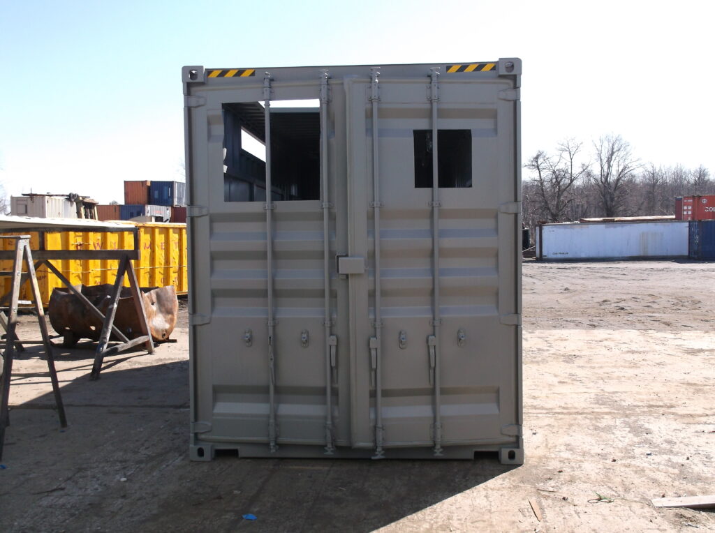 Steel Container with various cut outs and personnel doors installed (exterior)